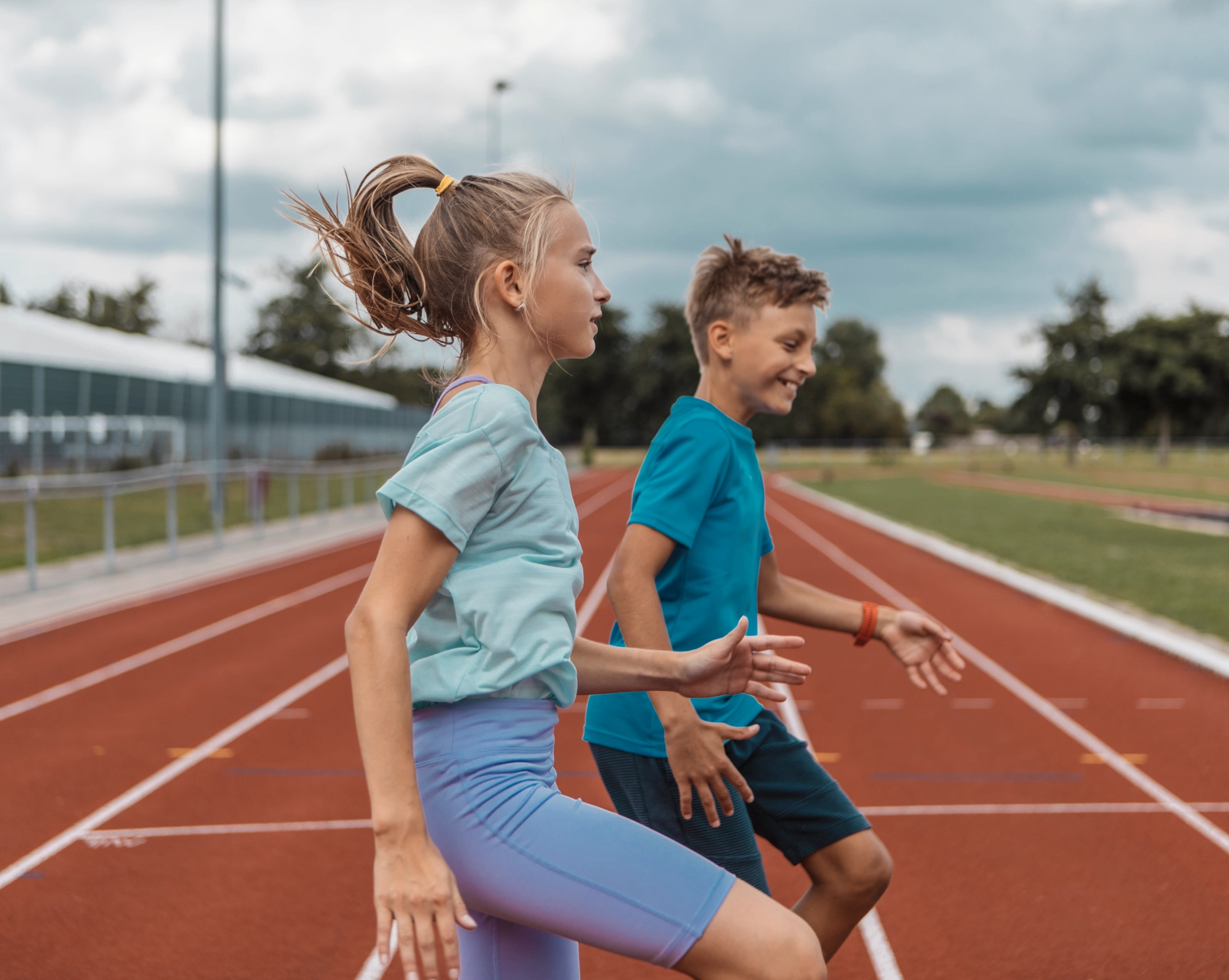 Children jogging outdoors