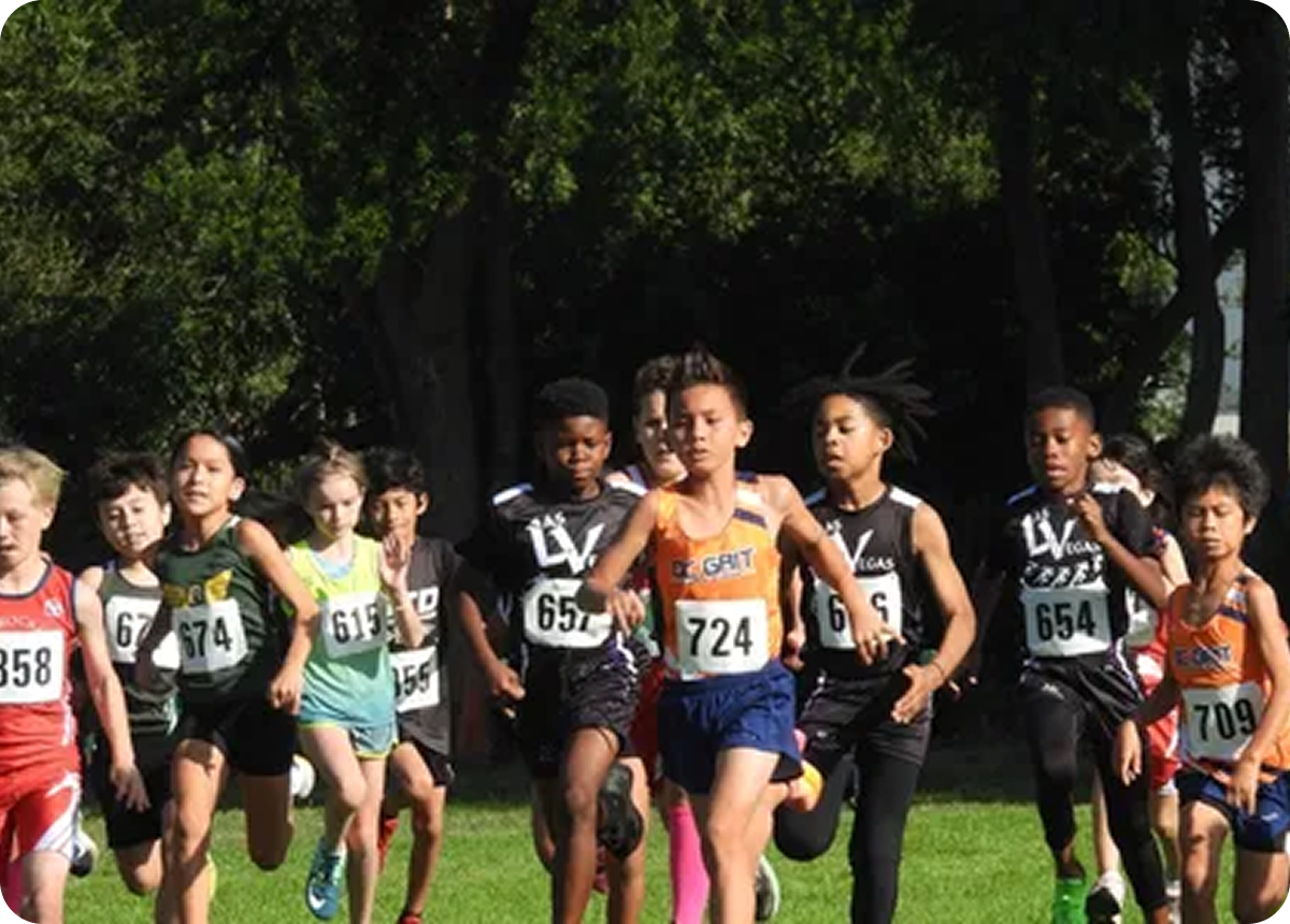 Young athletes sprinting outdoors