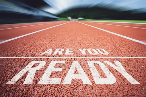 Running track with "Are You Ready" text.